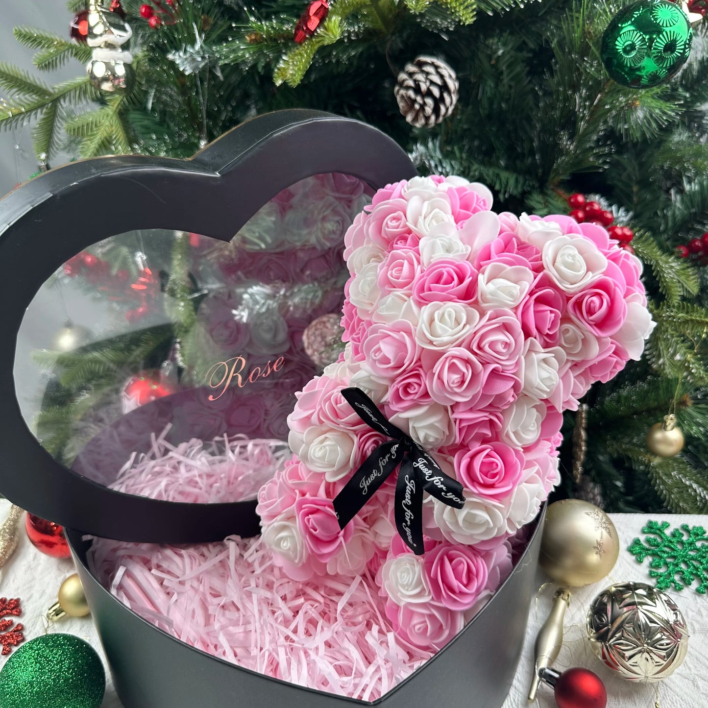 A TEDDY BEAR MADE OF ROSES