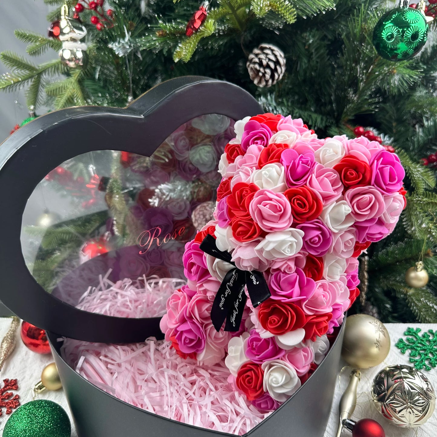 A TEDDY BEAR MADE OF ROSES