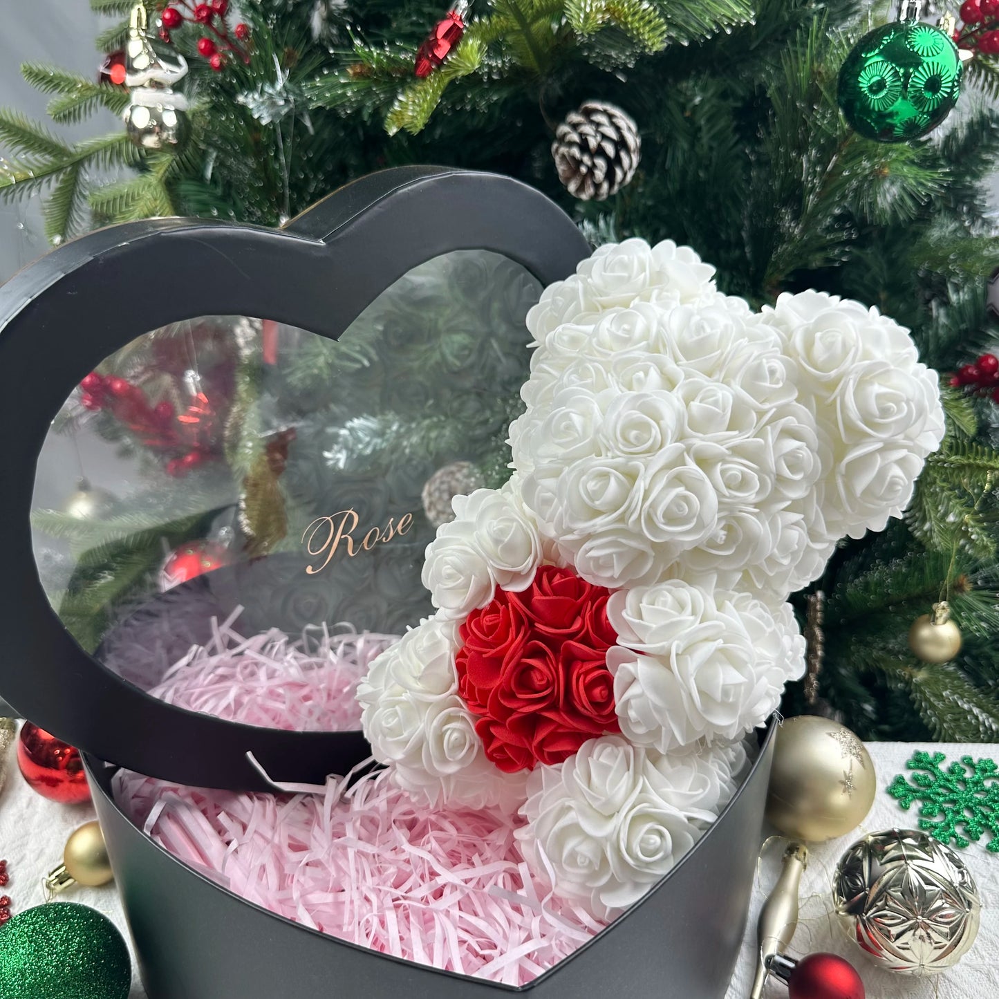 A TEDDY BEAR MADE OF ROSES
