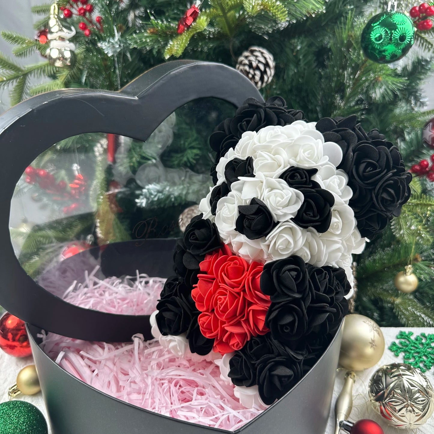 A TEDDY BEAR MADE OF ROSES