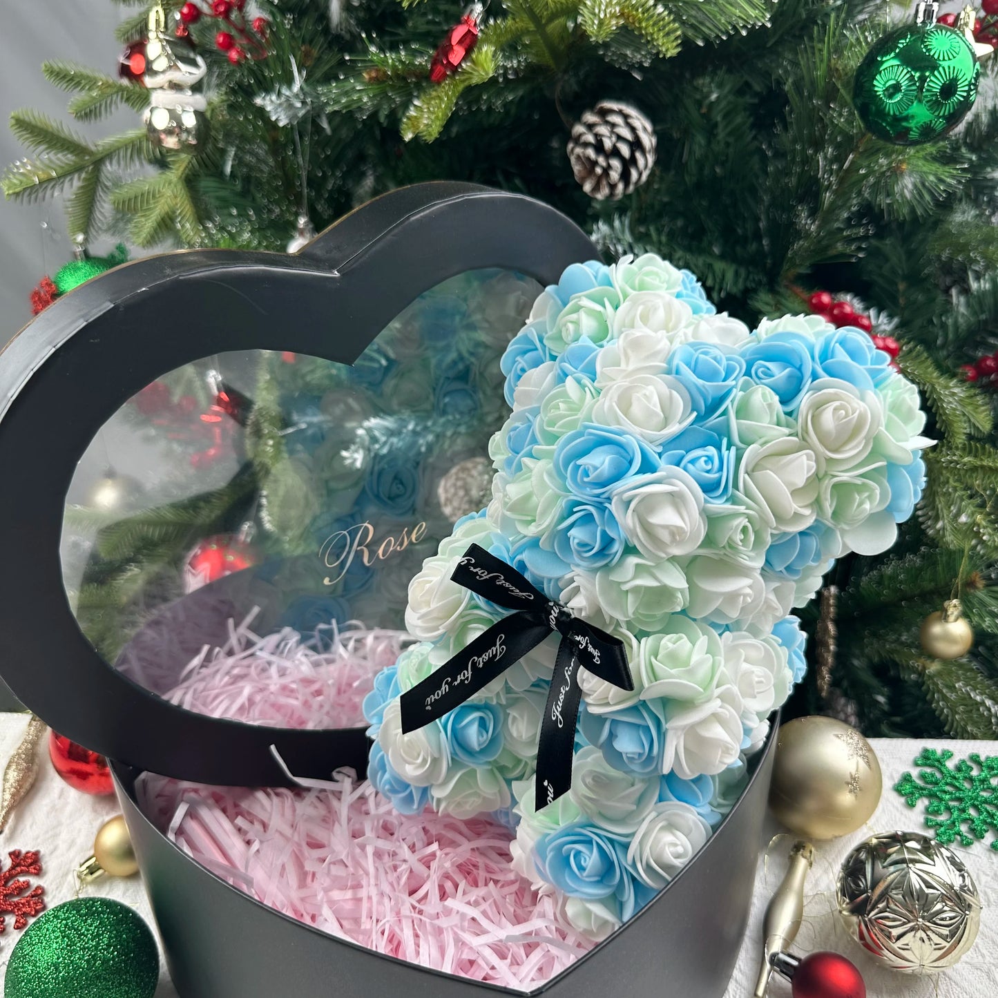 A TEDDY BEAR MADE OF ROSES