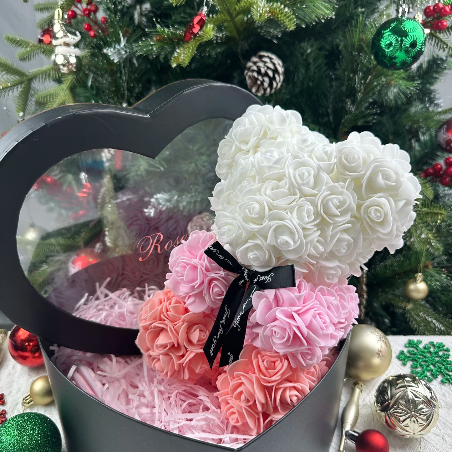 A TEDDY BEAR MADE OF ROSES